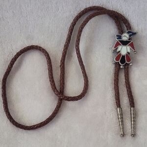 Brown Bolo Tie with Enamel Figure